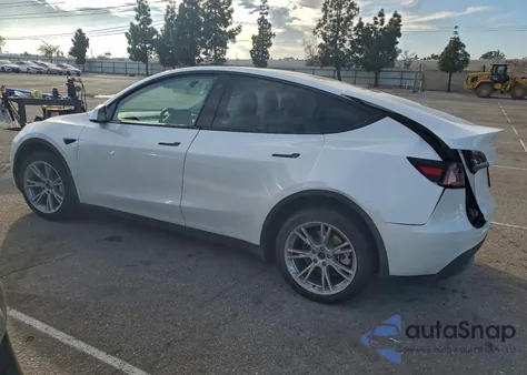 2023 Tesla Model Y from USA, damaged, VIN 7SAYGDEE2PF621085